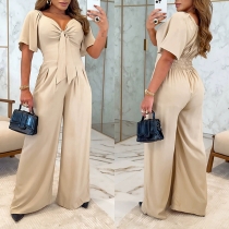 Short-Sleeve V-Neck Jumpsuit for Women with Bow Detail and Wide-Leg Design
