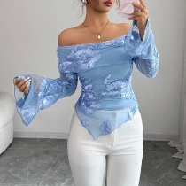 Flared Sleeve Top with Boat Neckline and Asymmetrical Hem Embroidered Design