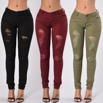 Stylish Solid Color Ripped Skinny Denim Pants For Women