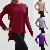 Trendy Solid Color Round Neck Long Sleeve Tassel High-low Hemline Tops