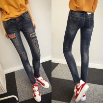 Trendy Letters Printed Spliced Ripped Slim Fit Women's Jeans