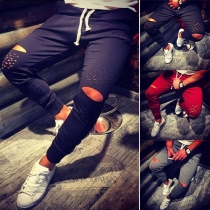 Hip-Hop Style Solid Color Elastic Waist Ripped Men's Casual Pants