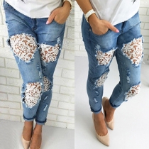 Sexy Hollow Out Lace Spliced Ripped Jeans