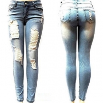 Distressed Style Low-waist Ripped Skinny Jeans