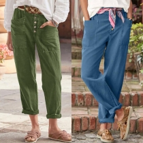 Pantalon boutonné à taille haute de couleur unie de style décontracté