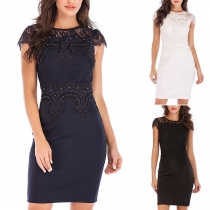 Fashion Solid Color Round-neck Sleeveless Embroidered Backless Over-hip Dress