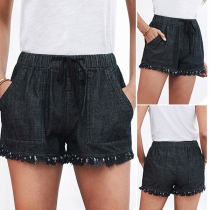 Fashion Solid Color Elastic Waist Tassel Hem Shorts