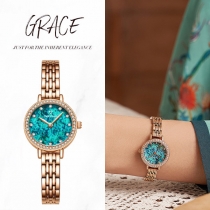 Women watch with rhinestones and aquamarine small dial