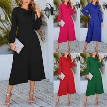 Fashion Solid Color Long Sleeve Round Neck Bowknot A-line Midi-dress