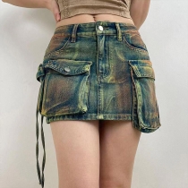 Asymmetrical High-Waist Denim Mini Skirt: Distressed Three-Dimensional Multi-Pocket Design